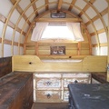 30.  Bed area with drawers filling under bed, forged pulls, Model A car back window