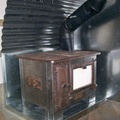 33. Stove on bench with corrugated heat shields