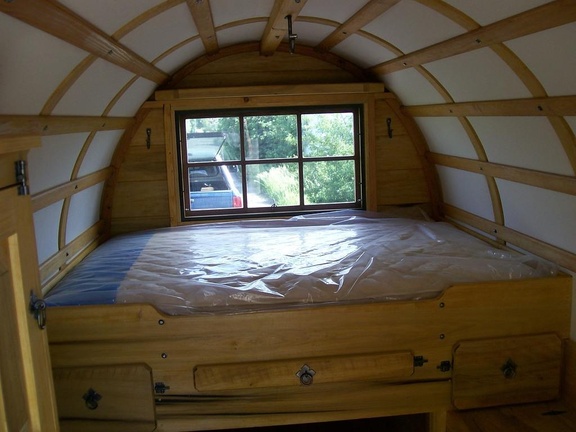 37. Bed area, cedar finish on poplar, 6 pane window