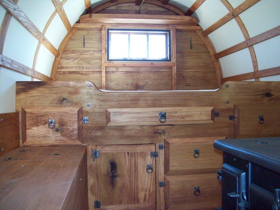 40. Bed area, poplar with Teak stain, 3 pane window and shelf